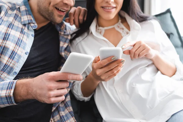 Cropped View Smiling Woman Pointing Finger Smartphone Boyfriend — Stock Photo, Image