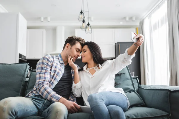 Selective Focus Young Woman Touching Boyfriend While Taking Selfie Smartphone — Stock Photo, Image