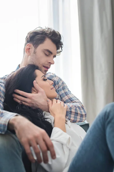 Selective Focus Handsome Man Hugging Touching Hair Attractive Woman Home — Stock Photo, Image