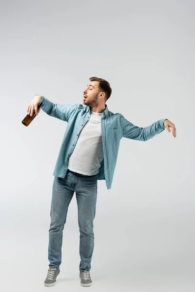 Young Man Posing Puppet Bottle Beer Isolated Grey — Stock Photo, Image