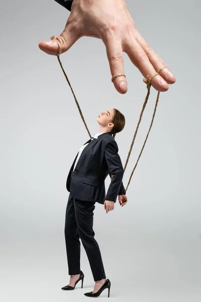 Cropped View Puppeteer Holding Businesswoman Marionette Strings Isolated Grey — Stock Photo, Image