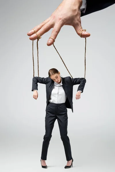 Cropped View Puppeteer Holding Businesswoman Marionette Strings Isolated Grey — Stock Photo, Image