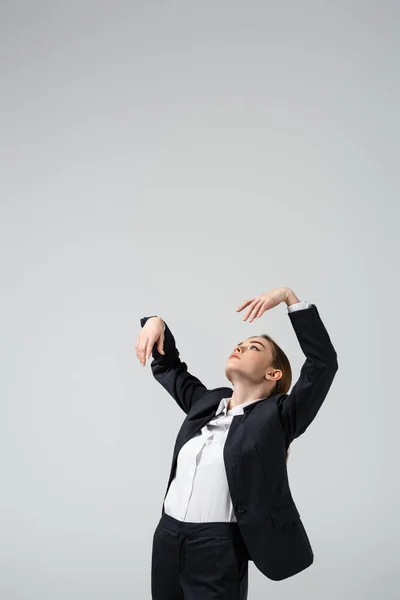 Businesswoman Marionette Suit Posing Raised Hands Isolated Grey — Stock Photo, Image