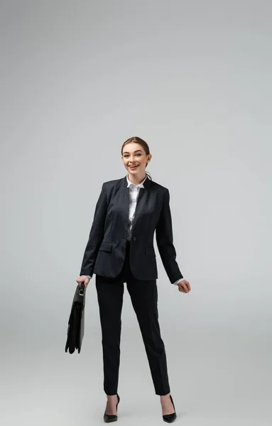 Cheerful Young Businesswoman Leather Suitcase Isolated Grey — Stock Photo, Image