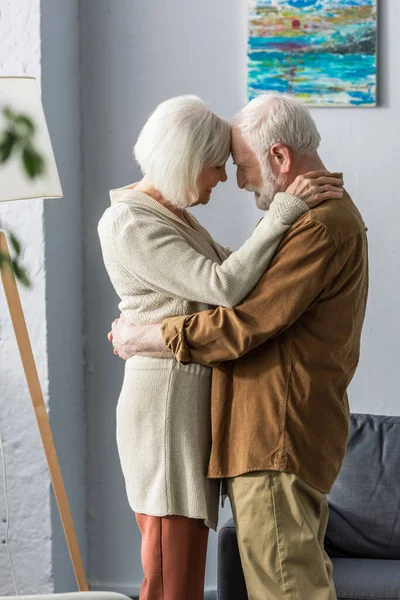 Side View Happy Senior Couple Embracing Smiling While Standing Face — Stock Photo, Image