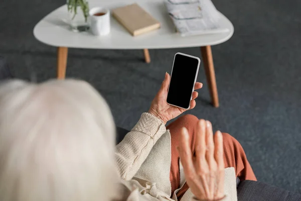 Overhead View Senior Woman Holding Smartphone Blank Screen While Sitting — Stock Photo, Image