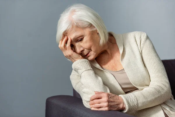 Senior Lonely Woman Holding Hand Face While Sitting Sofa — Stock Photo, Image