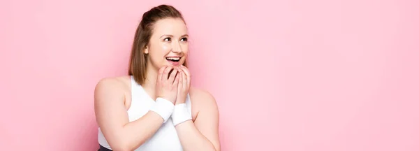 Panoramic Crop Excited Overweight Girl Touching Chin Looking Away Pink — Stock Photo, Image