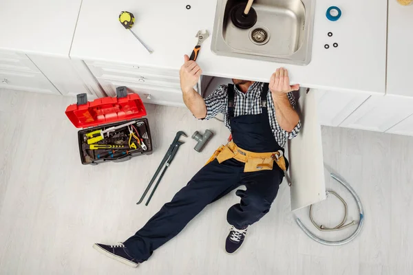 Top View Workman Taking Wrench While Repairing Sink Tools Kitchen — Stock Photo, Image
