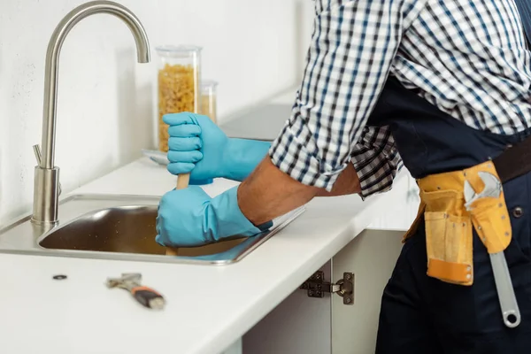 Cropped View Plumber Tool Belt Rubber Gloves Cleaning Blockage Kitchen — Stock Photo, Image