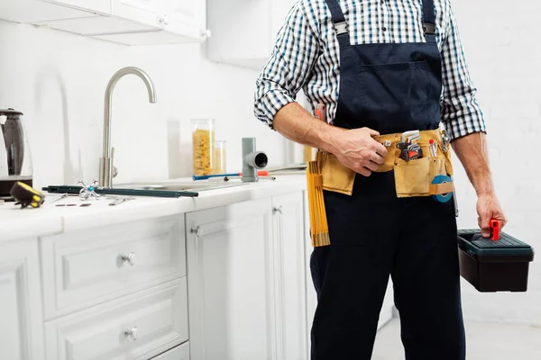 Cropped View Plumber Workwear Holding Toolbox Sink Faucet Kitchen — Stock Photo, Image