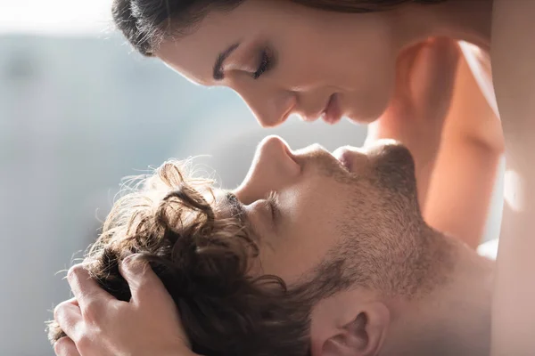 Side View Beautiful Woman Kissing Handsome Man Home — Stock Photo, Image