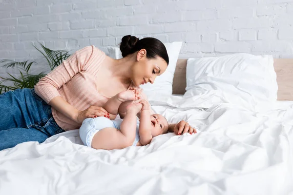 Beautiful Mother Looking Cute Infant Boy Bedroom — Stock Photo, Image