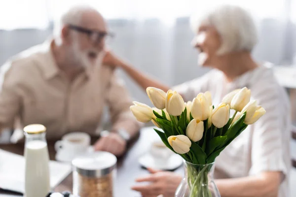 Selective Focus Tulips Vase Senior Couple Sitting Table Breakfast — Stock Photo, Image