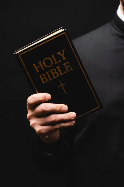 Cropped View Priest Holding Holy Bible Hand Isolated Black — Stock Photo, Image