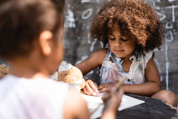 Selective Focus Curly Poor African American Child Writing Brother — Stock Photo, Image