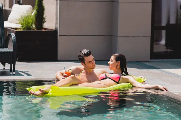 Attractive Woman Lying Inflatable Mattress Handsome Man Holding Cocktail Pool — Stock Photo, Image