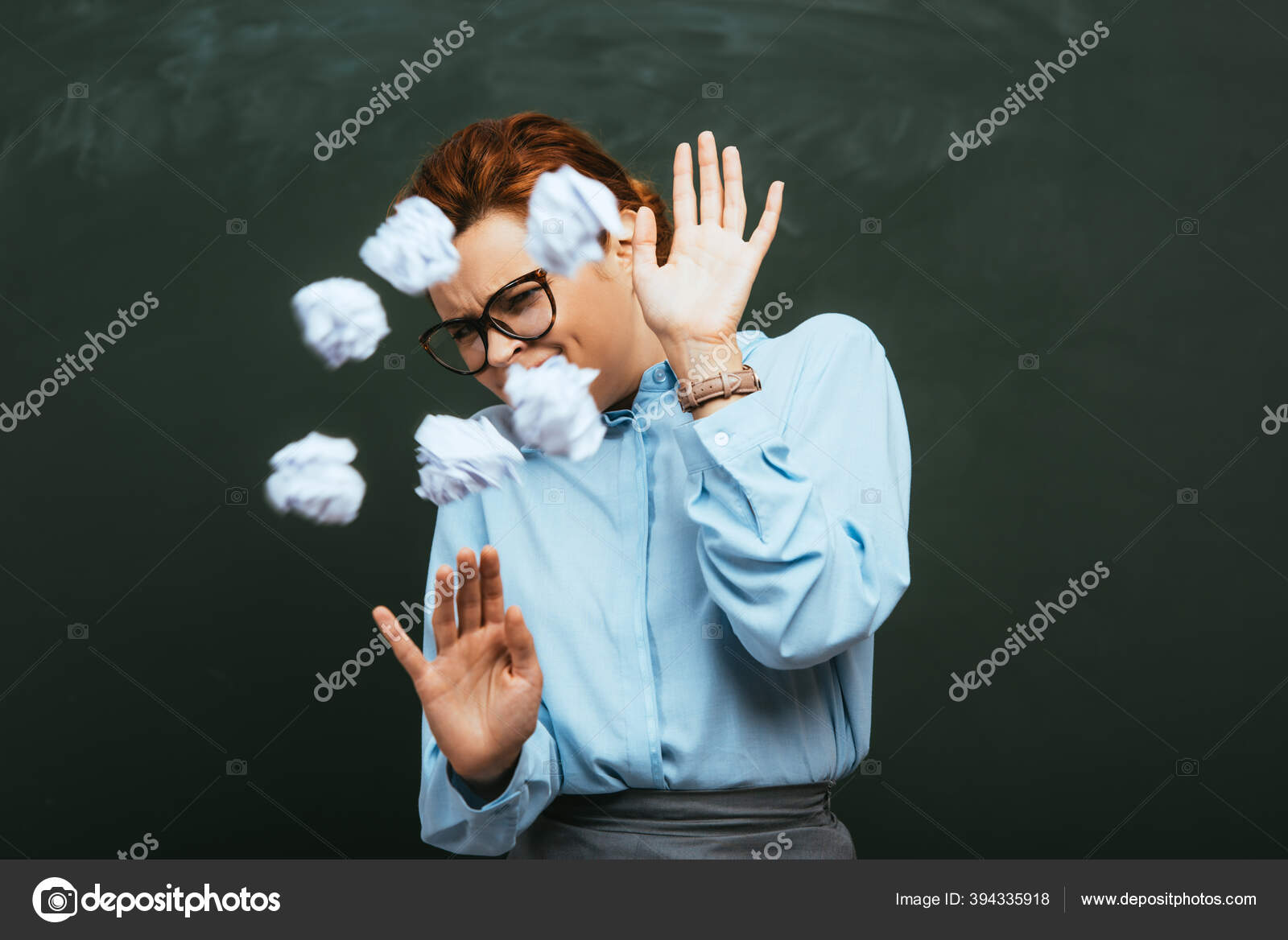 Selective Focus Teacher Defending Herself Throws Crumpled Paper
