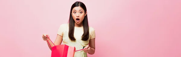 Panoramic Crop Shocked Young Asian Woman Holding Shopping Bag Pink — Stock Photo, Image