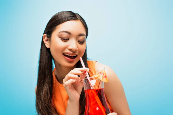 Cheerful Asian Girl Holding Looking Glass Cocktail Blue — Stock Photo, Image