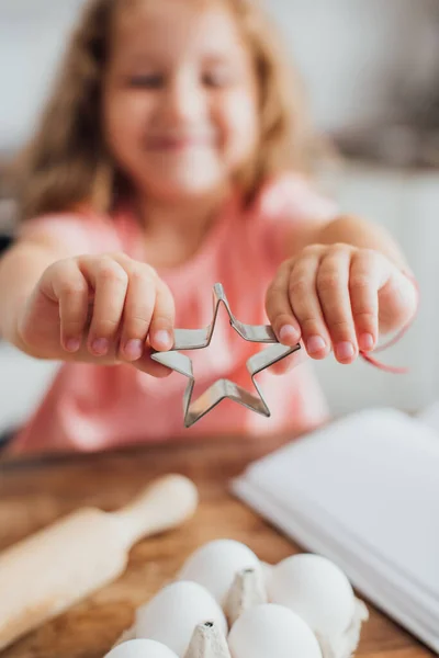 Selective Focus Kid Showing Star Shaped Cookie Cutter Chicken Eggs — Stock Photo, Image