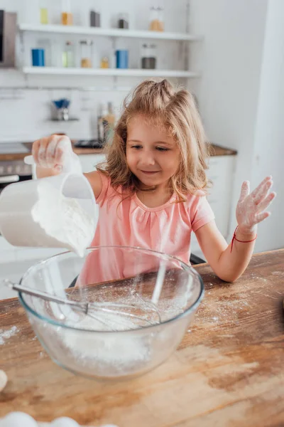 Little Girl Pouring Flour Glass Bowl While Cooking Kitchen — Stock Photo, Image