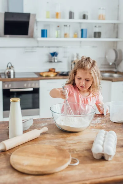 Selective Focus Child Mixing Flour Glass Bowl Whisk Bottle Milk — Stock Photo, Image