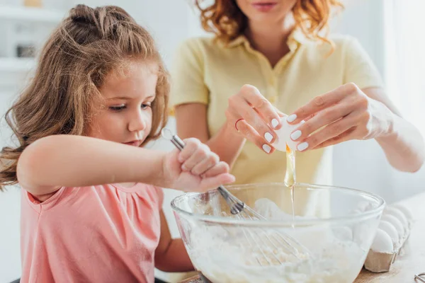 Cropped View Mother Adding Chicken Egg Glass Bowl While Daughter — Stock Photo, Image