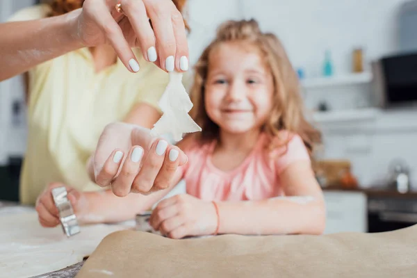 Cropped View Woman Holding Raw Tree Shaped Cookie Daughter Baking — Stock Photo, Image