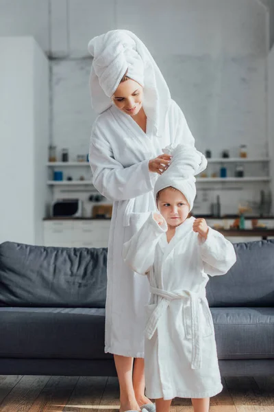 Young Woman Fixing Towel Head Daughter White Terry Bathrobe While — Stock Photo, Image