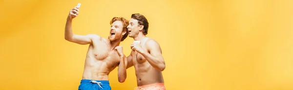 Horizontal Image Two Shirtless Friends Grimacing Showing Clenched Fists While — Stock Photo, Image