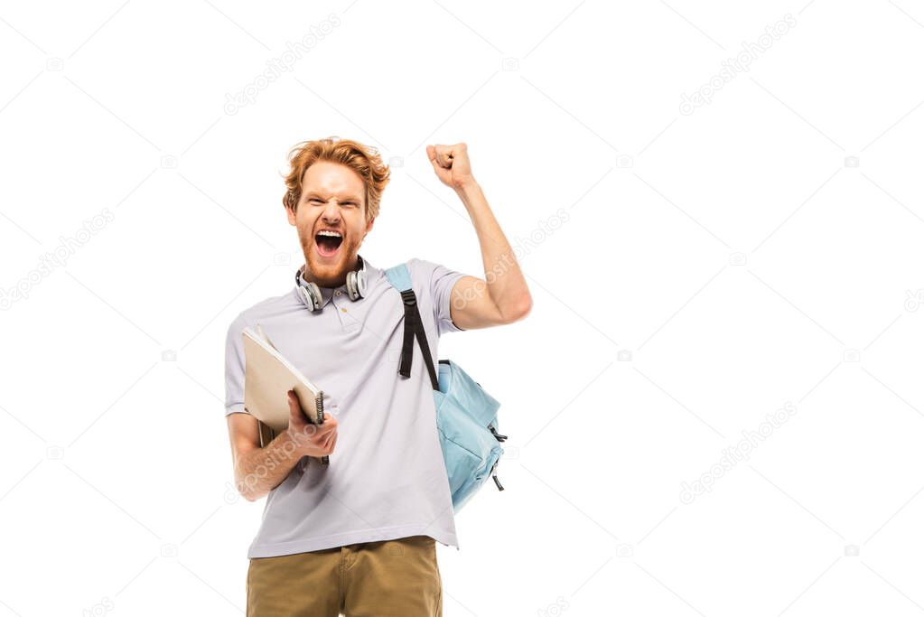 Student with backpack and notebook showing yes gesture isolated on white