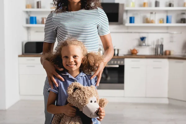 Cropped View Woman Striped Shirt Touching Shoulders African American Daughter — Stock Photo, Image