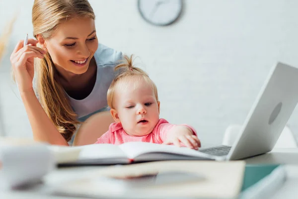 Selective Focus Infant Touching Notebook Laptop Mother Home — Stock Photo, Image