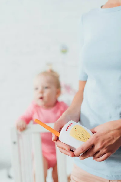 Selective Focus Woman Holding Baby Monitor Daughter Home — Stock Photo, Image