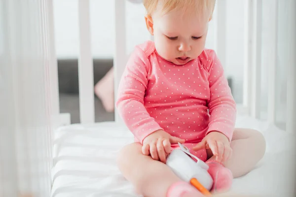 Selective Focus Infant Girl Holding Baby Monitor Crib — Stock Photo, Image