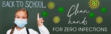 horizontal image of schoolgirl in medical mask pointing with finger near chalkboard and clean hands for zero infections lettering in classroom  clipart