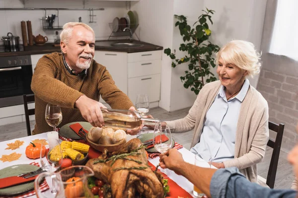 Senior Man Pouring White Wine Glasses Thanksgiving Dinner Family — Stock Photo, Image