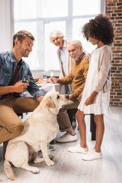African American Girl Looking Golden Retriever Family Celebrating Thanksgiving Day — Stock Photo, Image