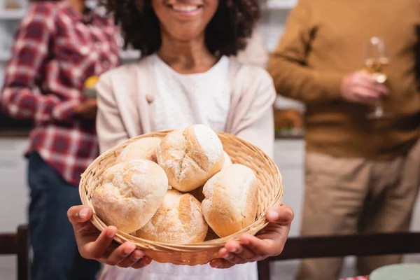 Cropped View African American Girl Holding Basket Buns Parents Home — Stock Photo, Image