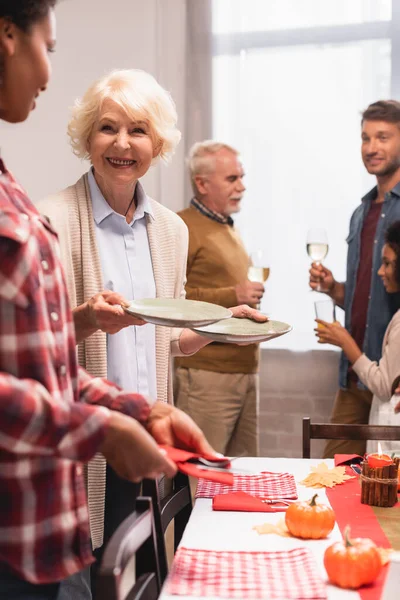 Selective Focus Multiethnic Family Serving Table Thanksgiving Celebration Home — Stock Photo, Image