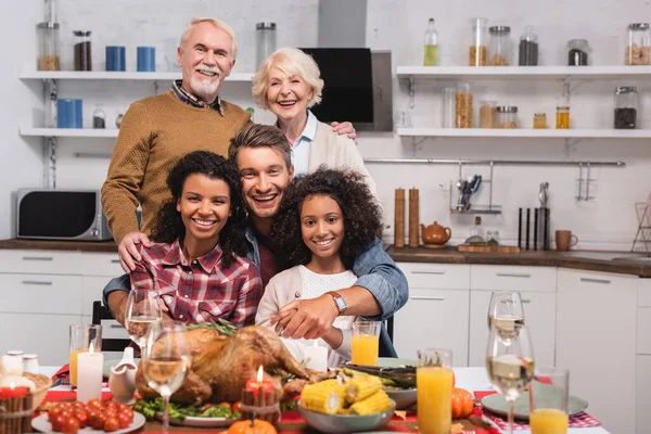 Selective Focus Multicultural Family Hugging While Celebrating Thanksgiving Home — Stock Photo, Image