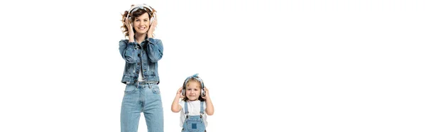 Mother Daughter Denim Outfits Listening Music Headphones Isolated White Panoramic — Stock Photo, Image