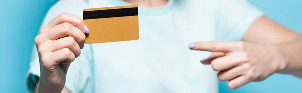 Selective Focus Young Woman Pointing Credit Card Blue Background Panoramic — Stock Photo, Image