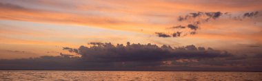 Horizontal crop of sky and sea during sunset  clipart