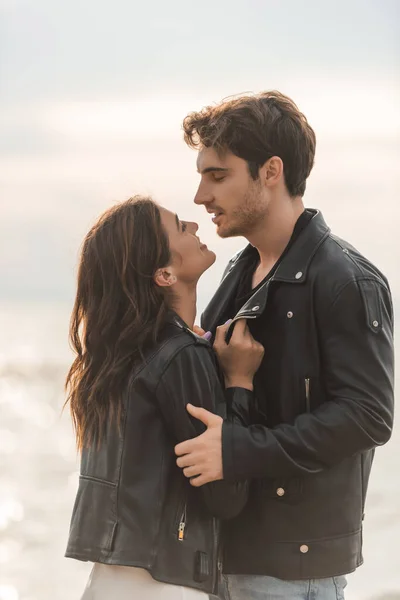 Young Woman Touching Leather Jacket Boyfriend Sea — Stock Photo, Image