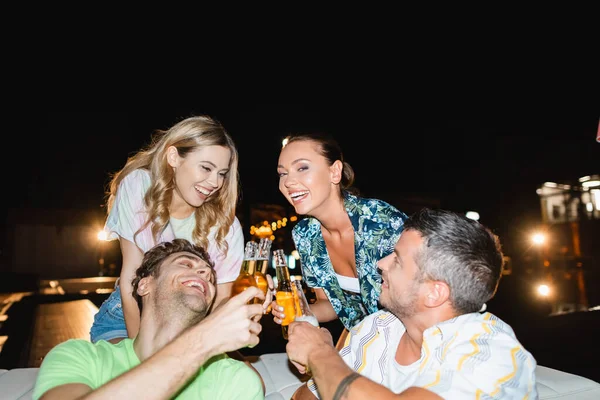 Selective Focus Friends Toasting Bottles Beer Party Outdoors Night — Stock Photo, Image