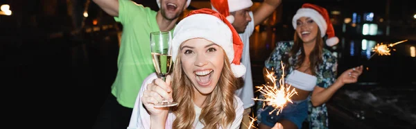 Horizontal Image Excited Woman Holding Glass Champagne Sparkler While Celebrating — Stock Photo, Image