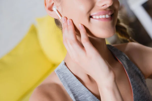 Cropped View Young Woman Touching Wireless Earphone — Stock Photo, Image