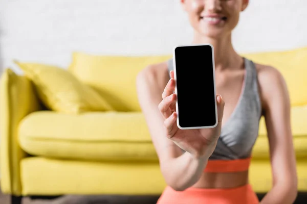 Cropped View Smiling Sportswoman Showing Smartphone Camera Living Room — Stock Photo, Image